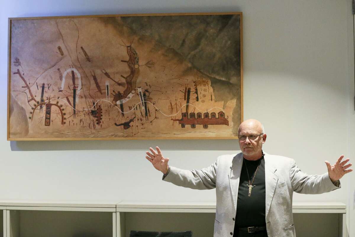 Greg Williams, CEO of The Rock Art Foundation, talks about a reproduction of the White Shaman (pictured), that he described as "one of the greatest narratives in the world," during a press conference at the Witte Museum's B. Naylor Morton Research and Collections Center on Sept. 28, 2016, to announce that the Witte Museum was taking over administration of the White Shaman Preserve in the Lower Pecos Canyonlands from the Rock Art Foundation. The Witte already had more than 20,000 artifacts from the preserve in its collections. The White Shaman is projected onto a rock wall in the Kittie West Nelson Ferguson People of the Pecos Gallery at the Witte.