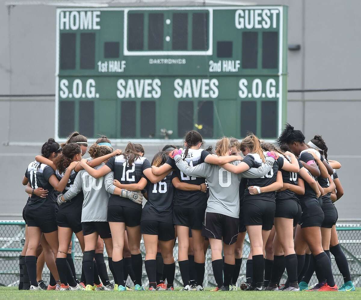 The Steele soccer team huddles before playing Vandegrift in the Region IV-6A girls soccer tournament Saturday at the Blossom Athletic Center. Vandegrift won 2-0.