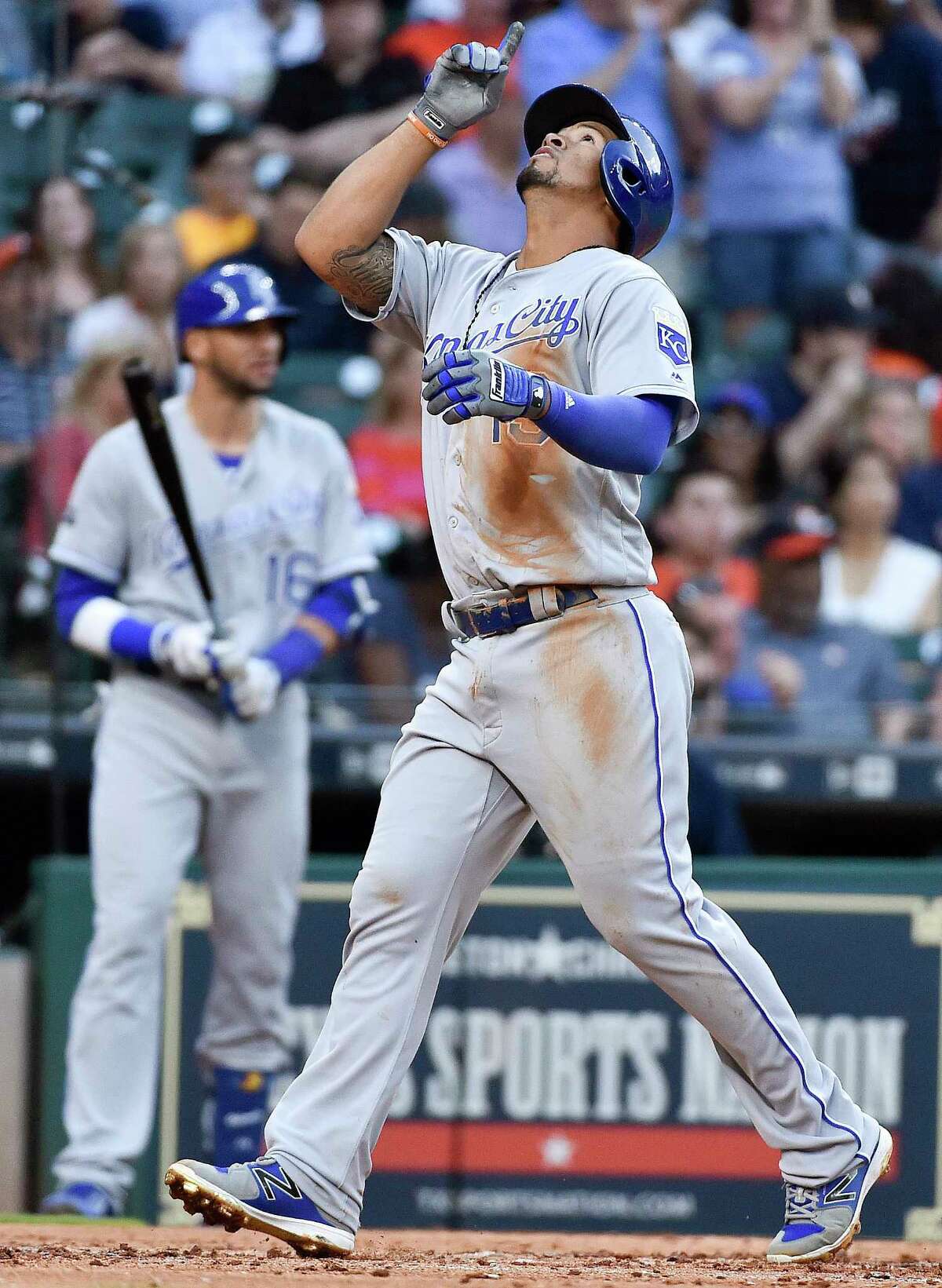 Kansas City Royals' Cheslor Cuthbert celebrates his solo home run off Houston Astros starting pitcher Dallas Keuchel during the fifth inning of a baseball game, Saturday, April 8, 2017, in Houston. (AP Photo/Eric Christian Smith)