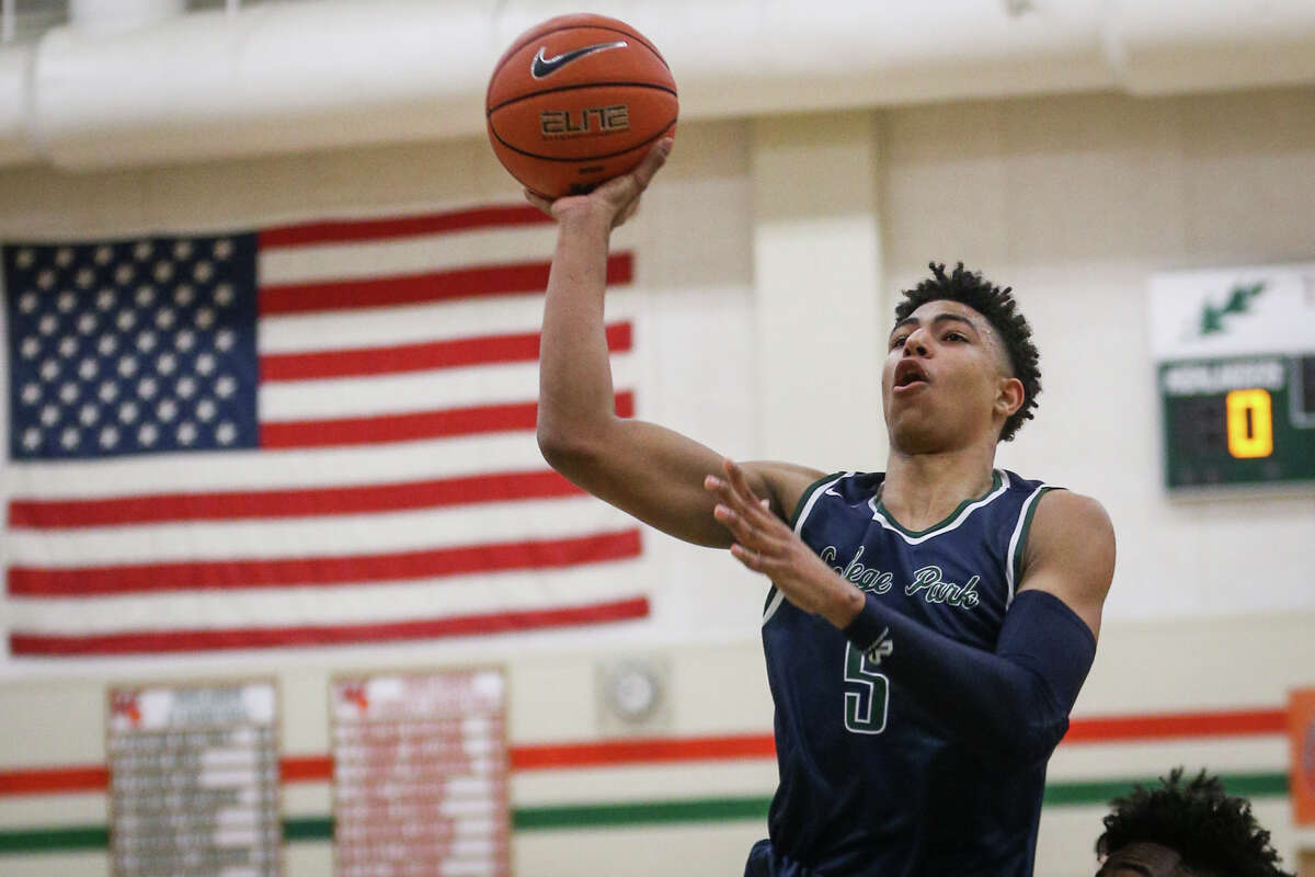 College ParkÂ?’s Quentin Grimes (5) shoots during the varsity boys basketball game against The Woodlands on Friday, Feb. 10, 2017, at The Woodlands High School. (Michael Minasi / Chronicle)