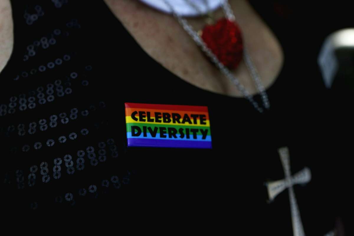 A pin reading "Celebrate Diversity" is seen on a Sister of Perpetual Indulgence on Sunday, April 9, 2017, in San FRANCISCO, Calif.