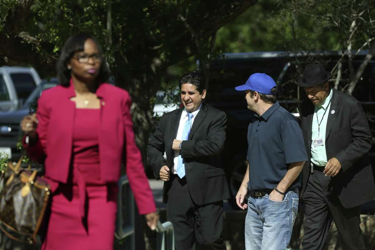 San Antonio mayoral candidate Manuel Medina, center, arrives for a debate at Univision, Monday, April 3, 2017. In front is San Antonio Mayor Ivy Taylor. Also in the debate was City Council member Ron Nirenberg.
