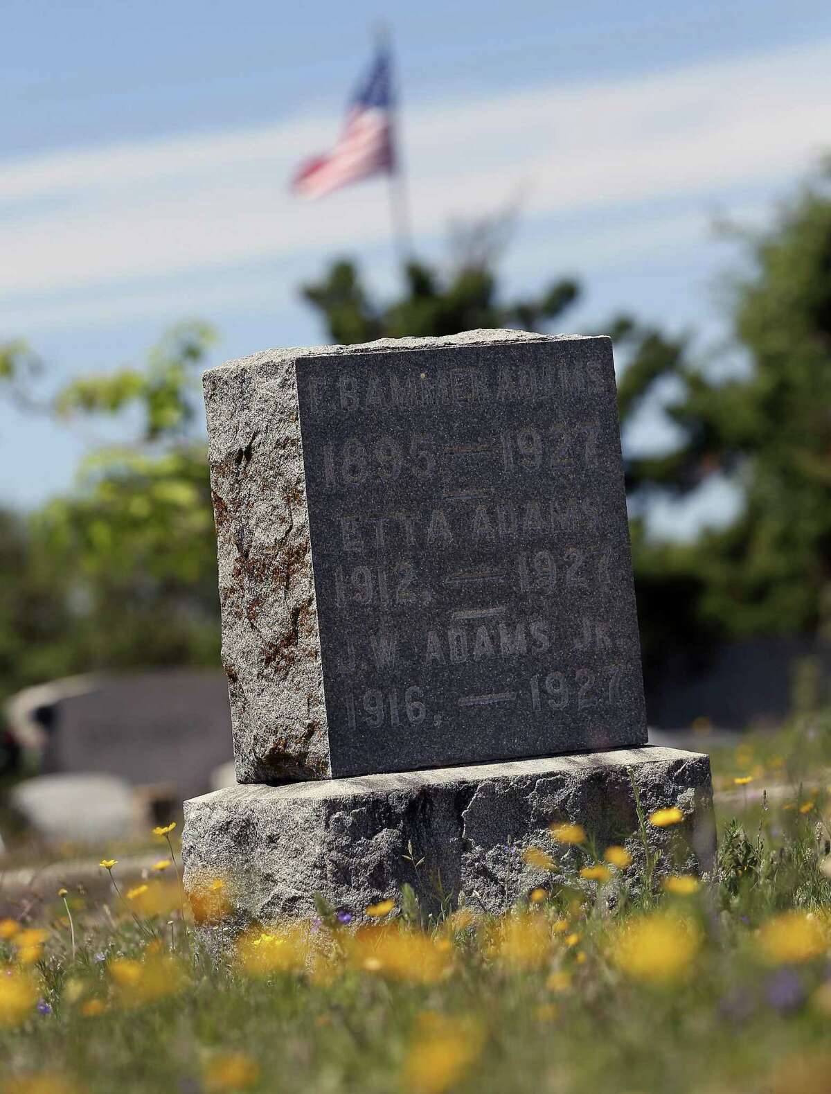A single headstone stands April 4, 2017 in the Rocksprings cemetery for the Adams family who were among the about 70 people killed in a 1927 tornado that destroyed all but a handful of buildings and left and additional 200 people injured.