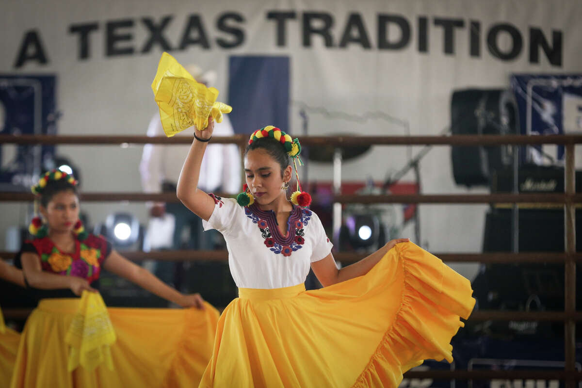 A dance group with Ballet Folklorico Ollinquetzali performs a dance from the Guerrero state of Mexico to Las Amarillas during El Dia de la Familia Hispana on Sunday, April 9, 2017, at the Montgomery County Fairgrounds.