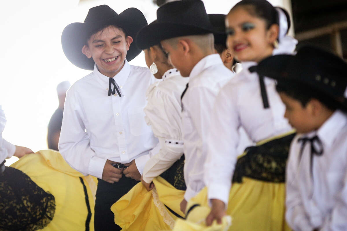 A dance group with Ballet Folklorico Ollinquetzali performs a dance from the Coahuila state of Mexico to Huapango San Buena during El Dia de la Familia Hispana on Sunday, April 9, 2017, at the Montgomery County Fairgrounds.