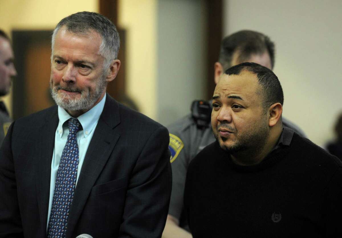 Oscar Hernandez, right, with his attorney John R. Gulash, faces Judge William Holden in Bridgeport Superior Court on Monday, April 10, 2017 in Bridgeport, Conn. Hernandez, 39, was arraigned on murder and kidnapping charges, his bond set at $2 million.