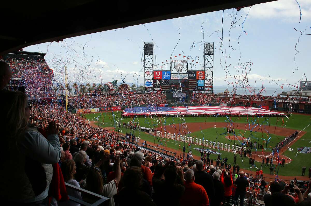 Buster Posey gets beaned, Giants prevail in home opener