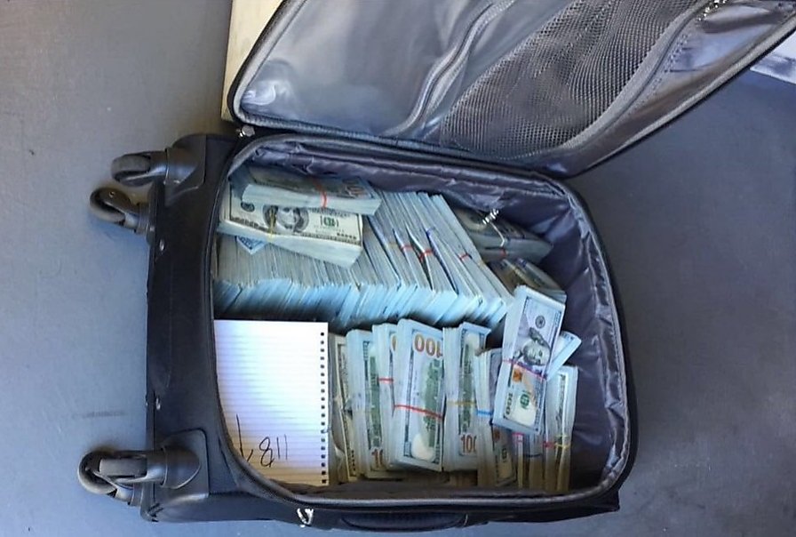 Traffic stop leads to seizure of 300 pounds of pot and $1M cash