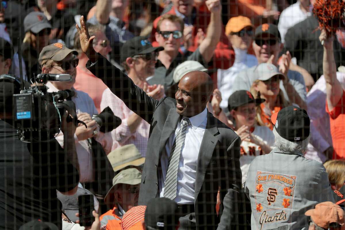 Former GIant Barry BOnds waves to the crowd during the game, as the San Francisco Giants went on to beat the Arizona Diamondbacks 4-1 in their home opener at AT&T Park in San Francisco, Calif. on Mon. April 10, 2017.