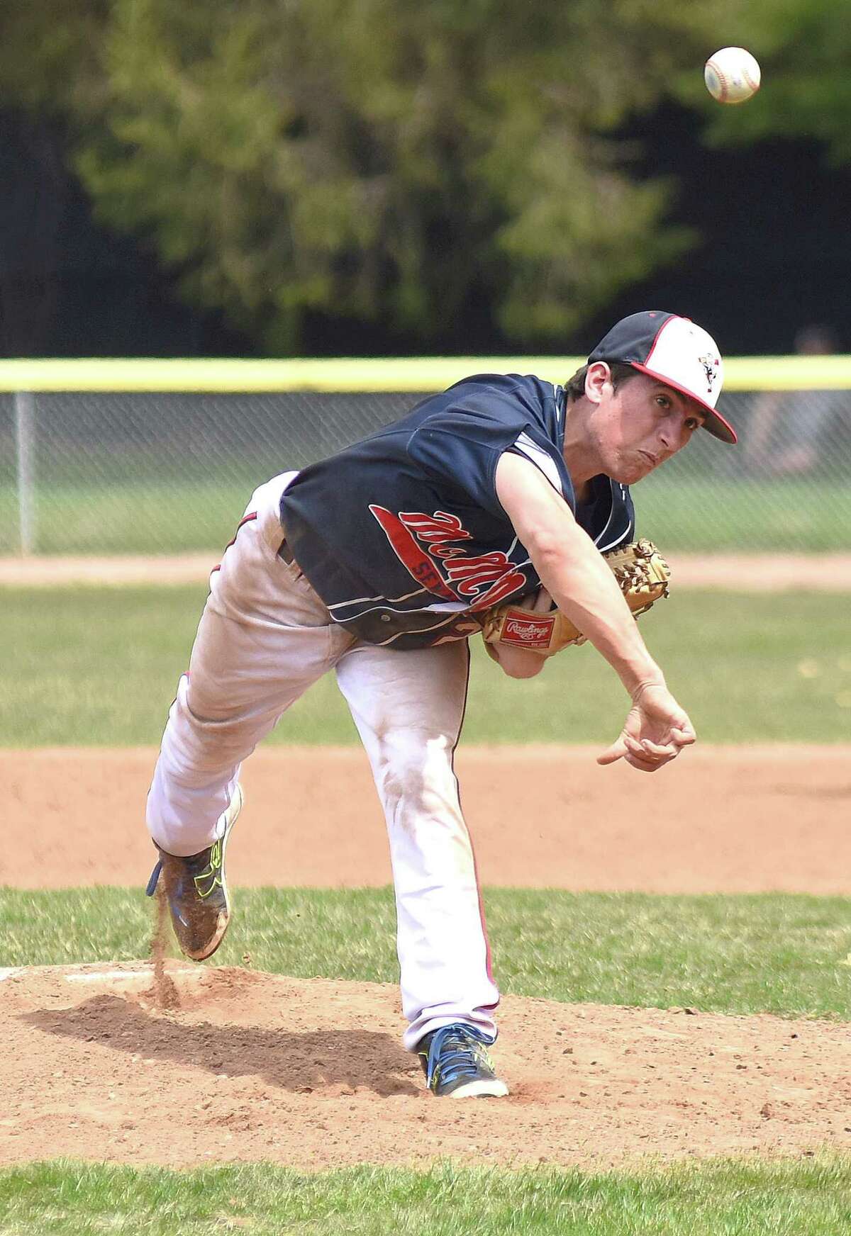 Brien McMahon sophomore pitcherJames Stefanowicz fires the ball to the plate during Monday's non-conference baseball game against Weston at Revson Field in Weston. Stefanowicz pitched five-plus shutout innings to lead the Senators to a 9-2 win.