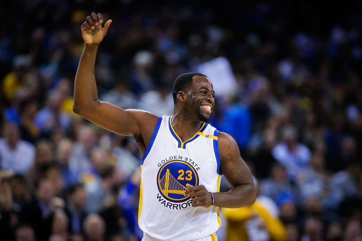 Golden State Warriors player Draymond Green (23) cheers after the referees call a foul in his favor in the second half of an NBA basketball game against the Utah Jazz at Oracle Arena in Oakland, Calif. on Monday, April 10, 2017. The Jazz defeated the Warriors 105-99.