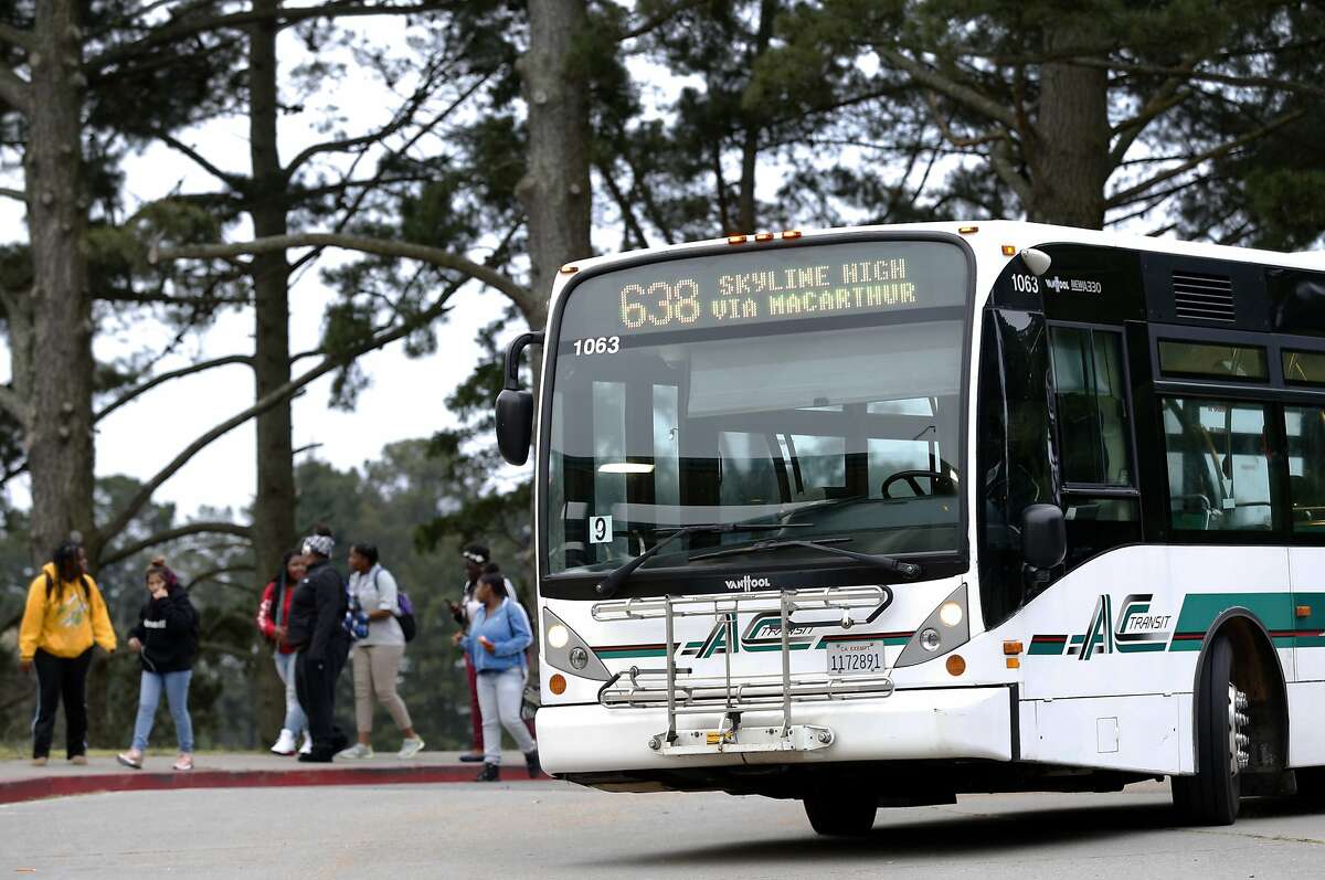 Skyline High students arrive by AC Transit bus for a day of classes at the school in Oakland, Calif. on Tuesday, April 11, 2017. The Oakland Unified School District and the transit agency are trying to come up with a solution to continue the school bus service after the district was forced to halt funding the direct service.
