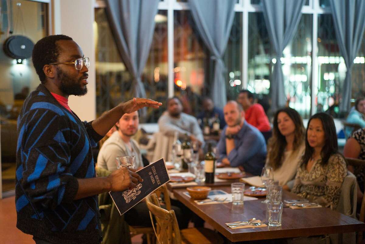 Tunde Wey addresses diners at his Blackness in America dinner at El Buen Comer in San Francisco, Calif. on Monday, April 11, 2017. Chef-activist Tunde Wey brings diners together to tackle issues like racism and immigration.