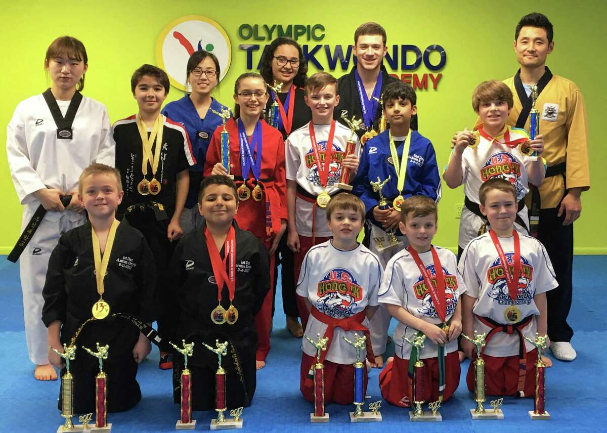 Seventeen martial artists from Hong's Taekwondo Academy of New Milford recently received several medals at the 13thU.S. HONG-IK Taekwondo Championship at Queens College in New York. Participants, ranging in age from 5 to 38, took home a total of 37 awards, all collected from competitions such as form, board breaking and the sparring. The participants are instructed by Master Hong, a young sixth degree black belt in Taekwondo from the prestigious Kyung Hee University in South Korea. Above are, from left to right, in front, Anton Gryb, Lorenzo Moronta, Tristan Baird, Jayden Anderson and Mason Wilson; second row, Soohyun Park, Ruben Barreto, Antonia Rodriquez, Ryan Anderson, Ashwin. K. Ram and Christopher Reiss; and in back, Min Ju Jung, Karina Batista, Jordan Silva, Master Seongho Hong. For more information about the academy, call: 860-799-7824 or visit www.olympictaekwondoacademy.com or www.facebook.com/hongkov.