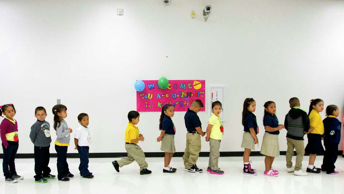Students line up during the first day of school at Thurgood Marshall Elementary, Monday, Aug. 26, 2013, in Houston. (Cody Duty / Houston Chronicle)