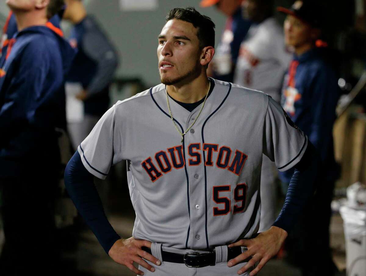Houston Astros starting pitcher Joe Musgrove stands in the dugout after he was pulled in the sixth inning of the team's baseball game against the Seattle Mariners, Tuesday, April 11, 2017, in Seattle. (AP Photo/Ted S. Warren)