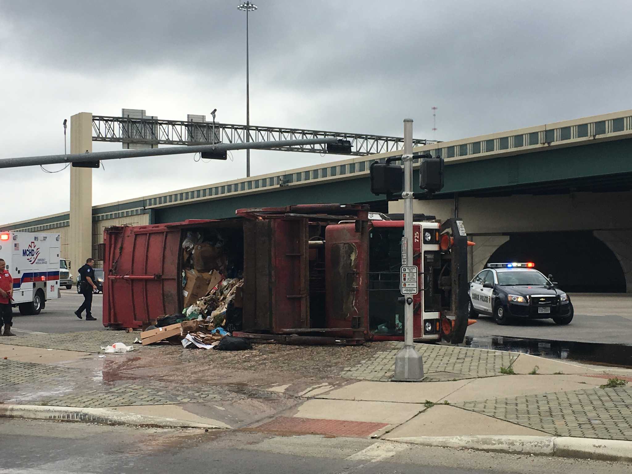 Tippedover garbage truck in Conroe shuts down part of Texas 105