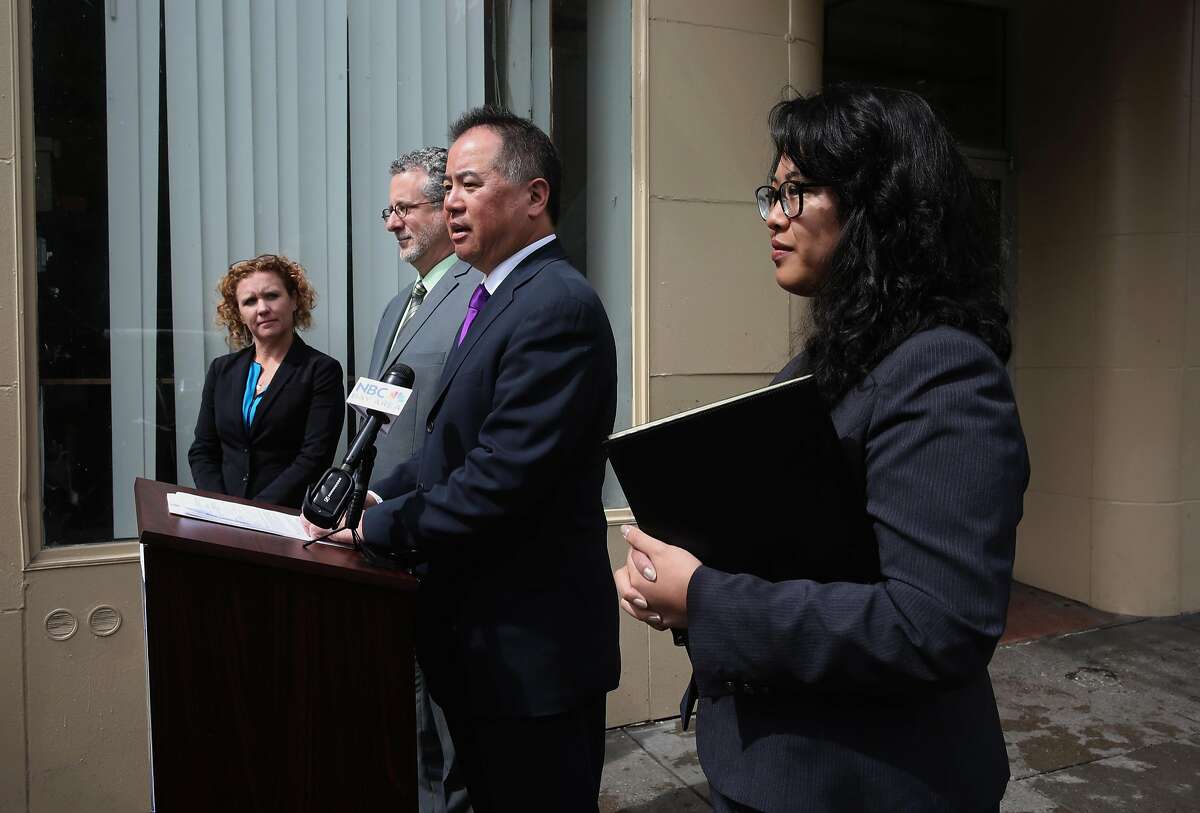 ( l to r) Christy Saxton, of Community Housing Partnership, Jeff Kositsy, director of Homelessness and Supportive Housing Assemblyman Phil Ting and Lenine Umali, of Compass Family services on Wed. April 12, 2017, in San Francisco, Calif., at the Civic Center Navigation Center. Ting announced he is introducing a bill to ease building regulations in San Francisco when it comes to emergency homeless shelters and supportive housing.