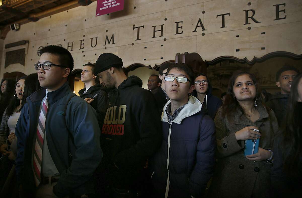 San Francisco high school students take a lunch break after watching fellow students perform original works inspired by US history before watching an afternoon performance of Hamilton at the Orpheum theater on Wednesday, April 12, 2017, in San Francisco, Calif.