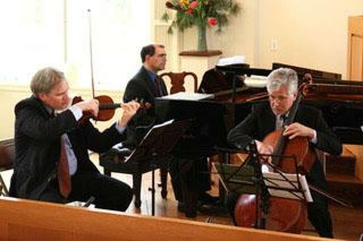 From left, Krystof Witek, Andrew Gordon and Danny Miller performing as the Chamber Players will be featured in concerts on April 23 and 24.