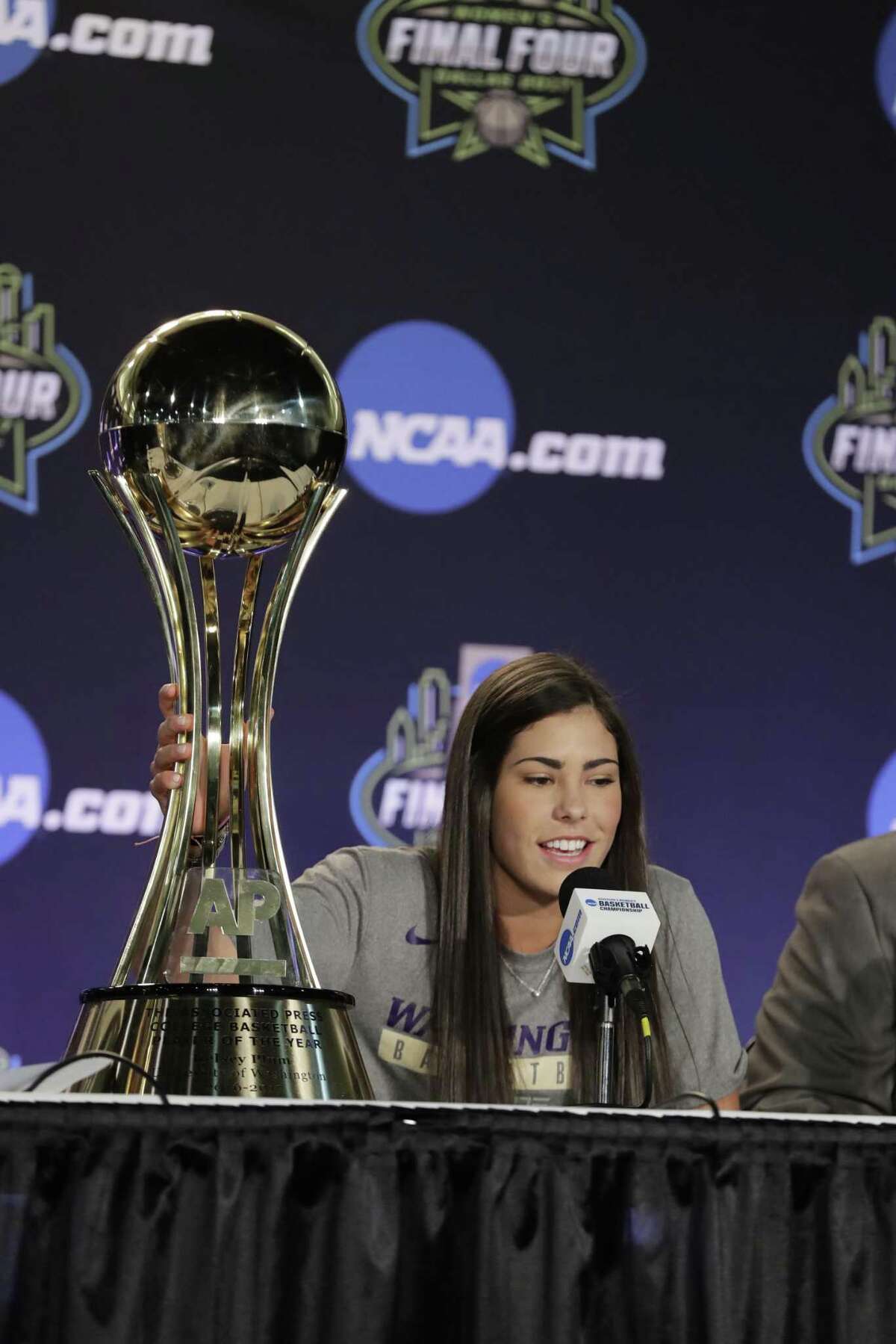Washington’s Kelsey Plum talks with the media after she was named AP Player of the Year at the women’s NCAA Final Four pm March 30, 2017, in Dallas.