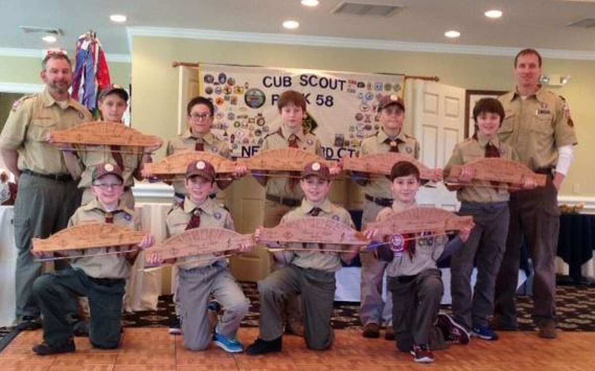 Webelo 2 Scouts from Cub Scout Pack 58 in New Milford recently received their Arrow of Light, the highest ranking award in Cub Scouts. Above, leaders Paul Natoli, back left, and Chris Roberts, back right, join Webelo 2 Scouts at the Arrow of Light ceremony, from left to right, in front, Ty Cossari, Ben Schipul, Michael Natoli and Morgan Marano, and in back, Christopher Gardner, Caleb Cerra, Connor Ciaglo, Evan Lovejoy and Waylon Jayne. Missing is Ryan Roberts.