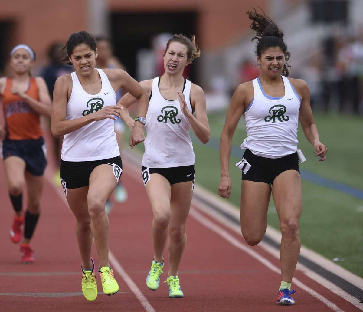 Reagan girls, Johnson boys pull away for 26-6A track titles