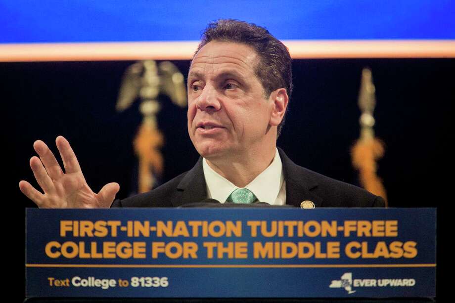 New York Gov. Andrew Cuomo speaks during a bill-signing event for the Excelsior Scholarship program, at LaGuardia Community College in New York, April 12, 2017. Hillary Clinton joined Cuomo on Wednesday. Photo: Sam Hodgson, The New York Times / NYTNS