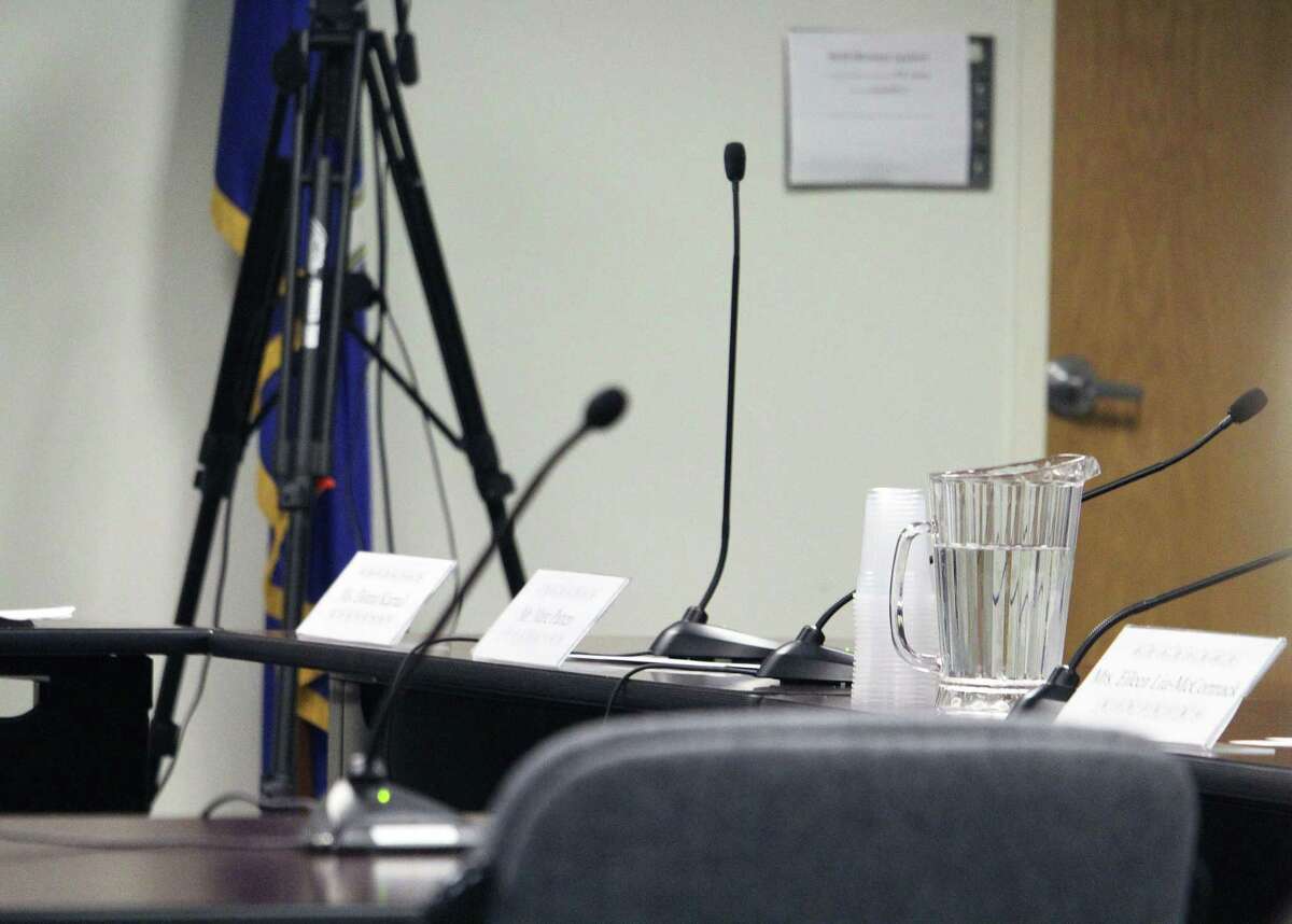 Board members Donna Karnal and Eileen Liu-McCormack left empty seats behind when they walked out of a Board of Education meeting in protest on April 6.