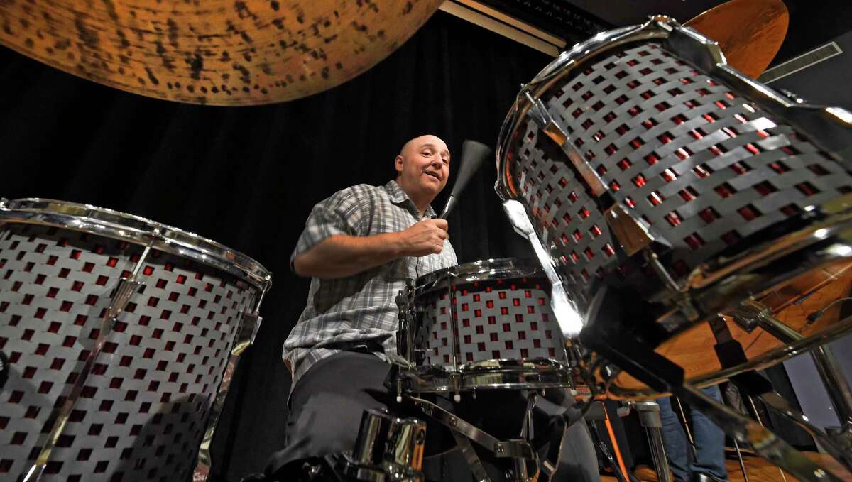 Drummer Brian Melick plays his Lego constructed drums during a demonstration at Hudson Valley Community College on Thursday, April 12, 2017, in Troy, N.Y. (Skip Dickstein/Times Union)