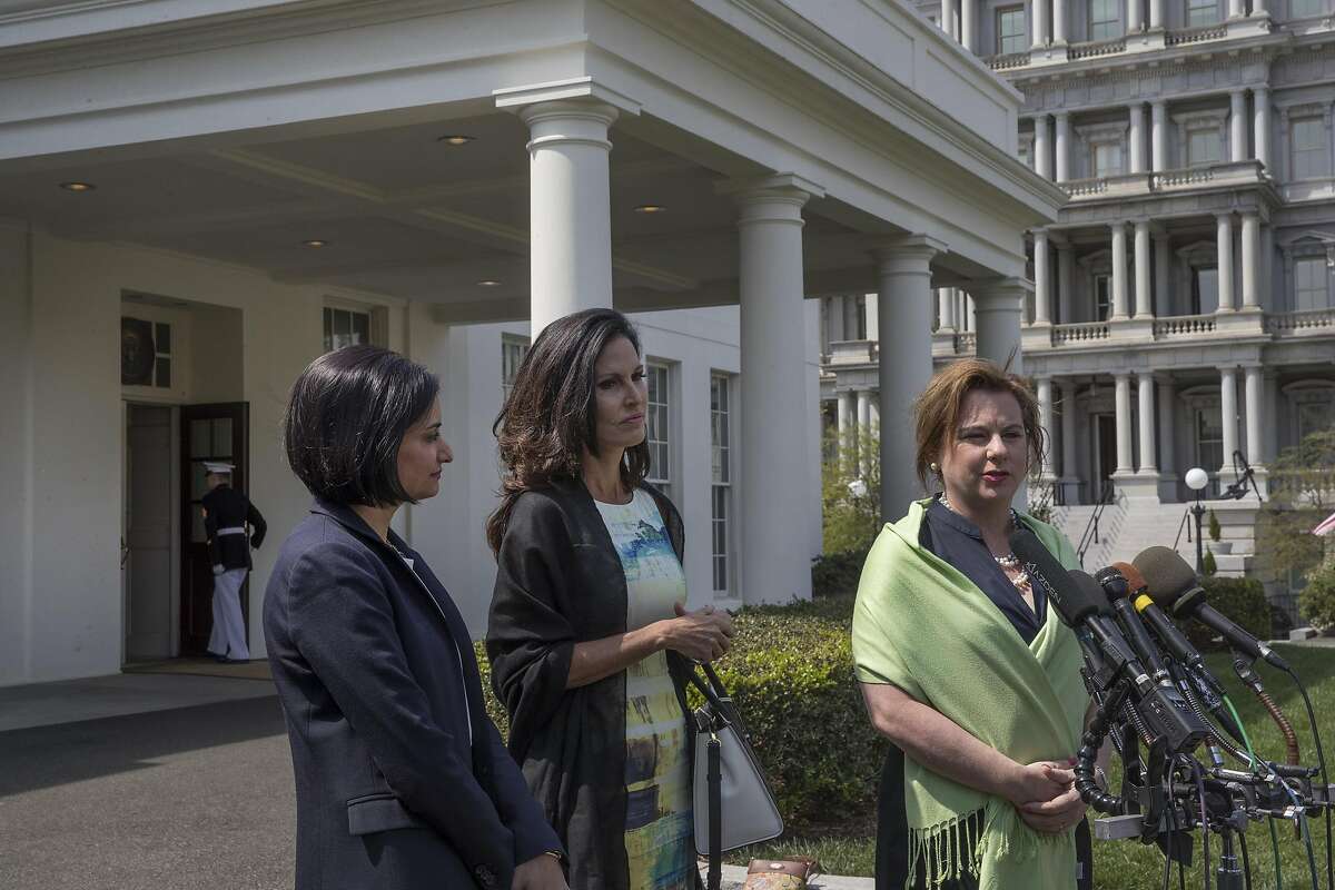 From left: Seema Verma, administrator of the Centers for Medicare and Medicaid Services; Penny Young Nance, chief executive for Concerned Women for America; and Marjorie Dannenfelser, president of the Susan B. Anthony List, speak to reporters after attending the signing of the H.J. Res. 43 legislation with President Donald Trump, at the White House, in Washington, April 13, 2017. The resolution allows states to withhold federal funds from Planned Parenthood and other abortion providers. (Stephen Crowley/The New York Times)