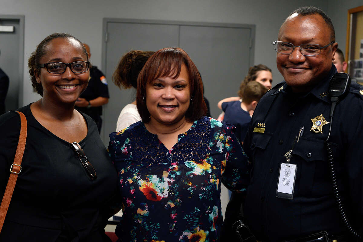 Veronica Durden, Karen Moore and Maj. Marlon Lewis at a swearing-in and promotion ceremony for the Jefferson County Sheriff's Office on Thursday. Photo taken Thursday 4/13/17 Ryan Pelham/The Enterprise