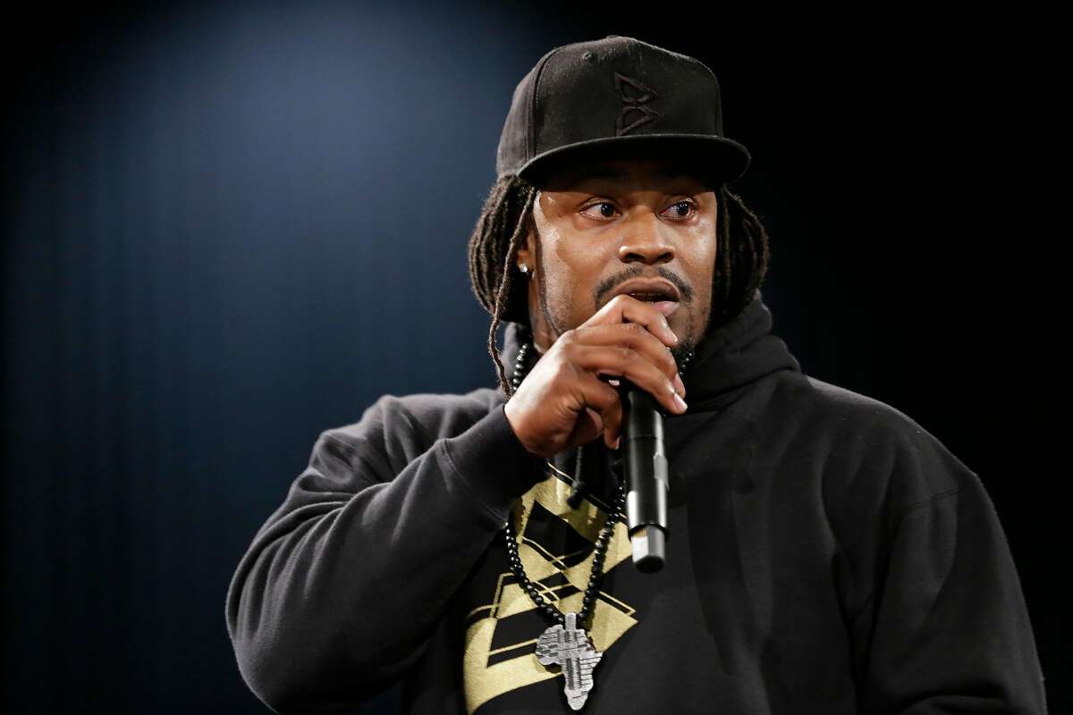 Marshawn Lynch, a former NFL football running back with the Seattle Seahawks, speaks Thursday, May 5, 2016, at a job fair in Seattle sponsored by the 100,000 Opportunities Initiative, an organization backed by Starbucks and other companies that seeks to increase employment and education opportunities for youth aged 16-24. The Seahawks announced Thursday that Lynch has been placed on the reserve/retired list. (AP Photo/Ted S. Warren)