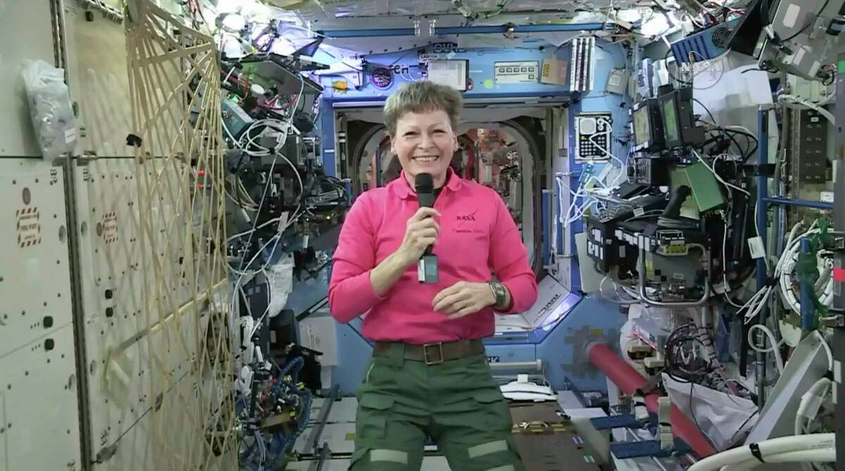 In this Thursday, April 13, 2017 image from video made available by NASA, astronaut Peggy Whitson speaks during an interview aboard the International Space Station. The commander of the ISS says that five months into her current mission, sheÂ?’s still not bored. At 57, she's the oldest woman to fly in space and is on the verge of setting a U.S. record for most accumulated time in space. (NASA via AP)