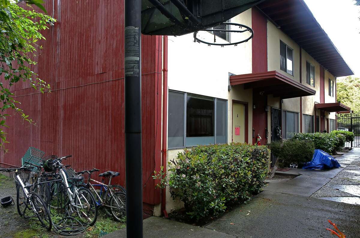 The apartment complex on the 3028 Deakin St. as seen on Thurs. April 13, 2017, in Berkeley, Calif. Apartment number 4, (end unit) which has been red tagged is where the bodies of a two people were found on January 23rd. The cause of death has been found to be carbon monoxide poisoning.