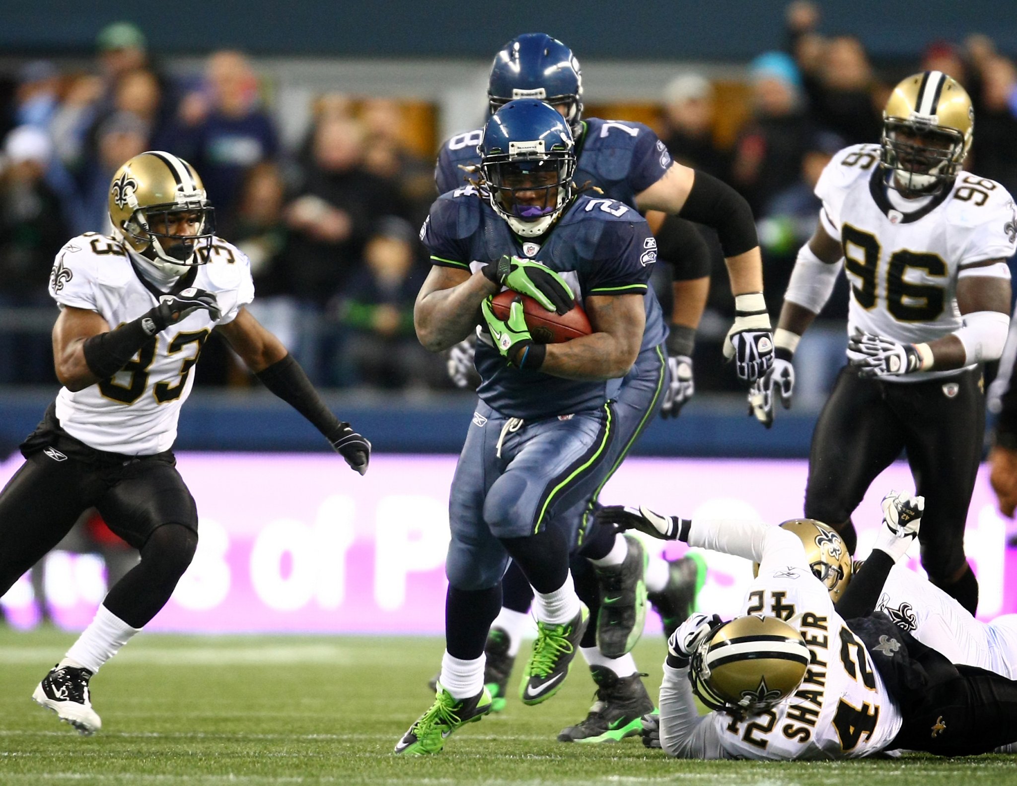 Marshawn Lynch of the Seattle Seahawks eats Skittles as he addresses  News Photo - Getty Images