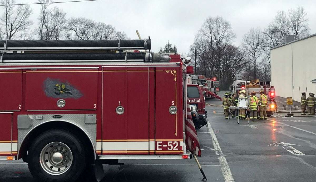 Stamford firefighters respond to a two-alarm blaze that they say started in the woman's locker room of the Italian Center on Newfield Avenue, Stamford, Conn, April 6, 2017.