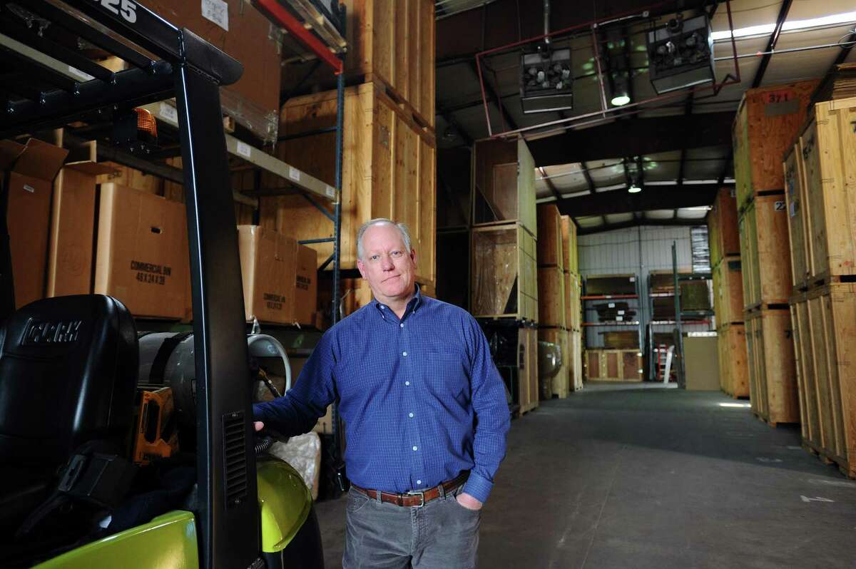 Kaster Moving Co. founder and President Kevin Kaster poses for a photo inside his company's warehouse in Stamford, Conn. on Monday, April 10, 2017. Kaster Moving Co. is celebrating its 40-year anniversary this year.