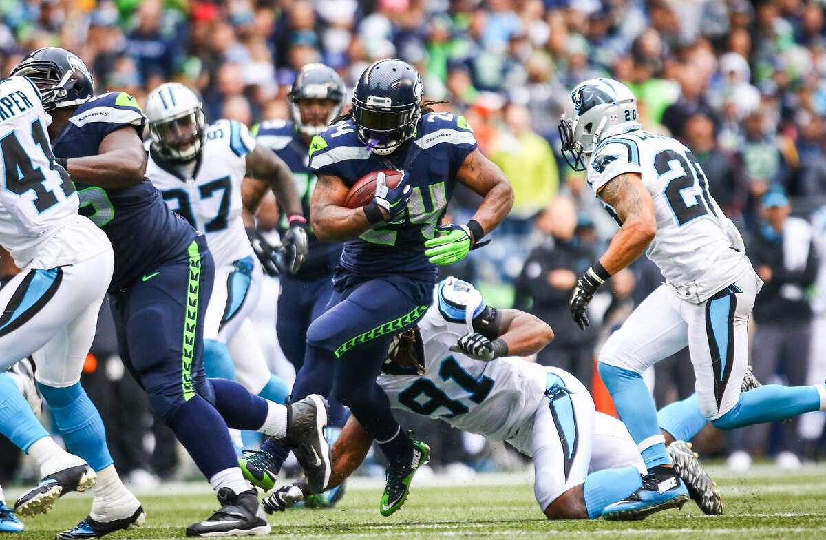Seattle Seahawks player Marshawn Lynch gains yards against the Carolina Panthers on Sunday, October 18, 2015. 