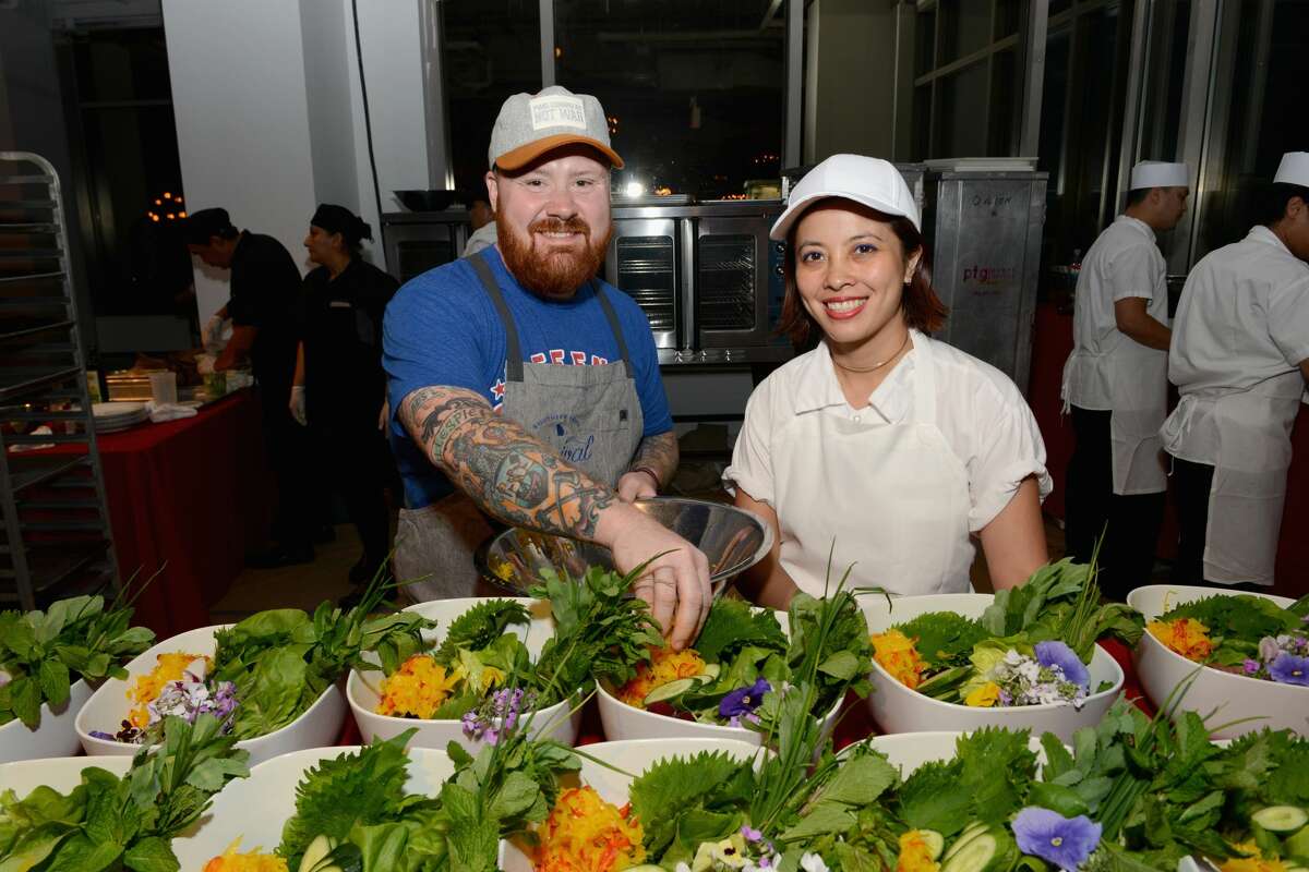 Chefs Kevin Gillespie, left, and Angela Dimayuga attend The (RED) Supper hosted by Mario Batali with Anthony Bourdain on June 2, 2016 in New York City. Dimayuga recently earned some attention for a response turning down an interview with IvankaTrump.com.