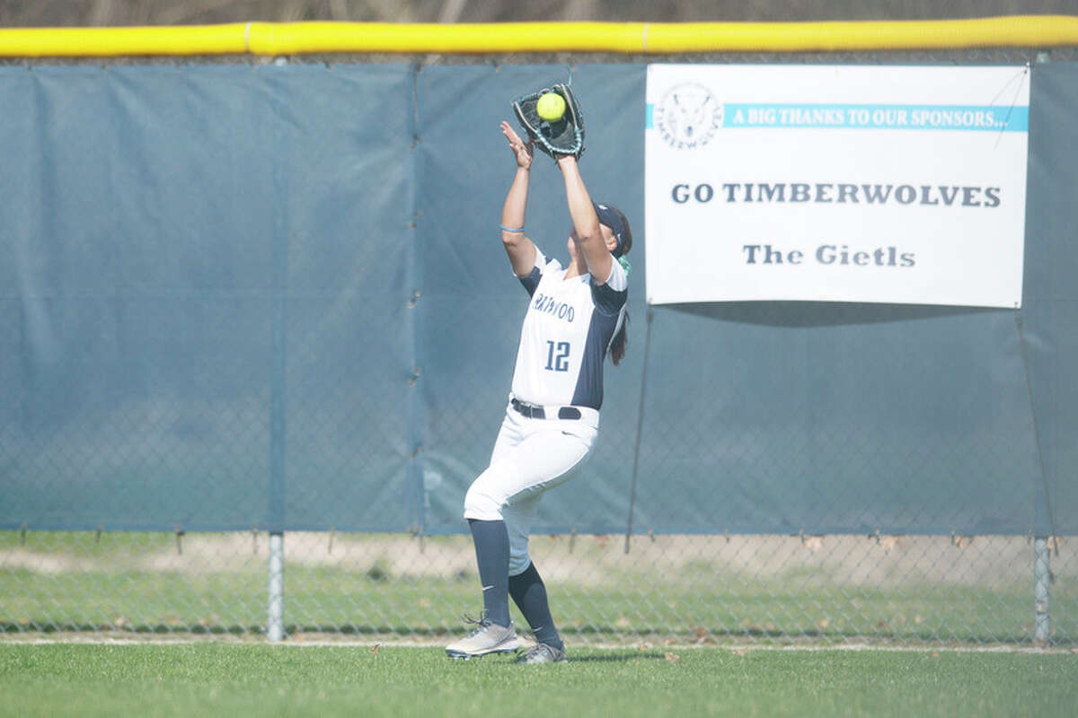 BRITTNEY LOHMILLER | blohmiller@mdn.net Northwood's Sydni Pauley catches a ball in right field on Friday against Grand Valley State.