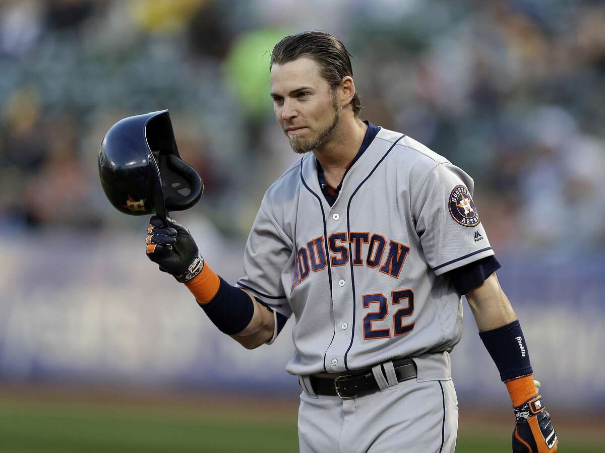 Houston Astros' Josh Reddick (22) tips his helmet to fans as he comes to bat against the Oakland Athletics in the first inning of a baseball game Friday, April 14, 2017, in Oakland, Calif. This is Reddick's first return to Oakland since July of 2016, when he was a right fielder for the Athletics. (AP Photo/Ben Margot)