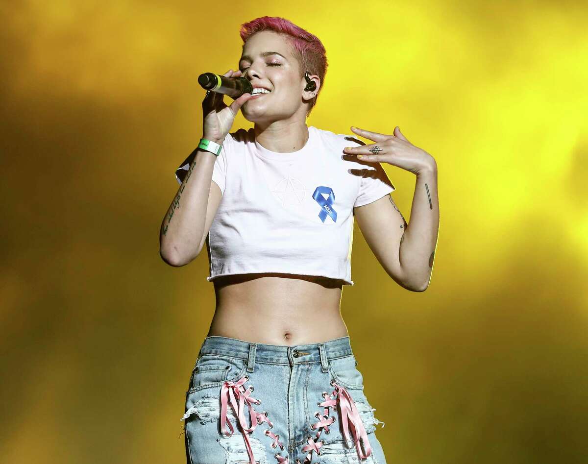 FILE - In this April 3, 2017 file photo, Halsey perform at the Zedd Presents WELCOME! - Fundraising Concert Benefiting The ACLU in Los Angeles. Lady Gaga will perform at the Coachella Valley Music and Arts festival this weekend, marking a decade since a solo woman has been billed as a headliner. Halsey, the Grammy-nominated singer who is readying her second alternative album and had one of last year?’s biggest pop hits with ?“Closer?” alongside the Chainsmokers, performed at Coachella last year. (Photo by John Salangsang/Invision/AP, File) ORG XMIT: NYET454
