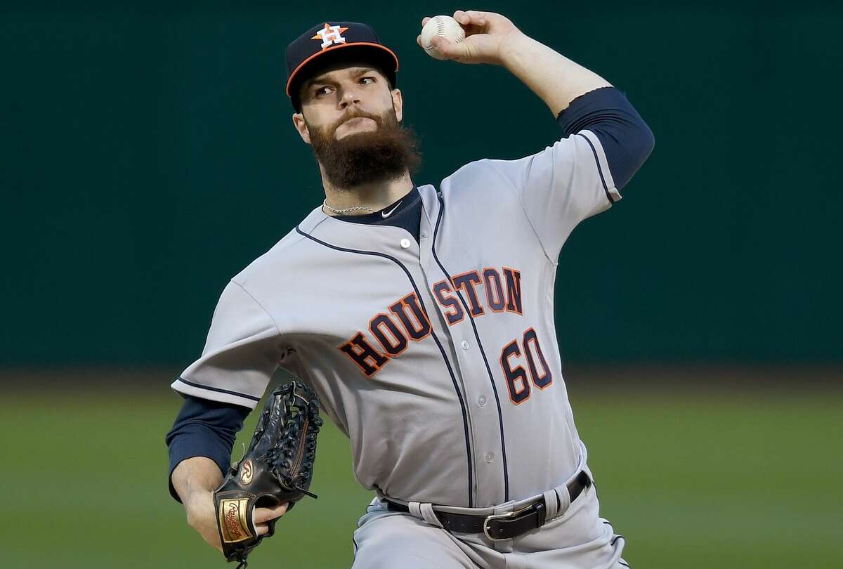 OAKLAND, CA - APRIL 14: Dallas Keuchel #60 of the Houston Astros pitches against the Oakland Athletics in the bottom of the first inning at Oakland Alameda Coliseum on April 14, 2017 in Oakland, California. (Photo by Thearon W. Henderson/Getty Images)