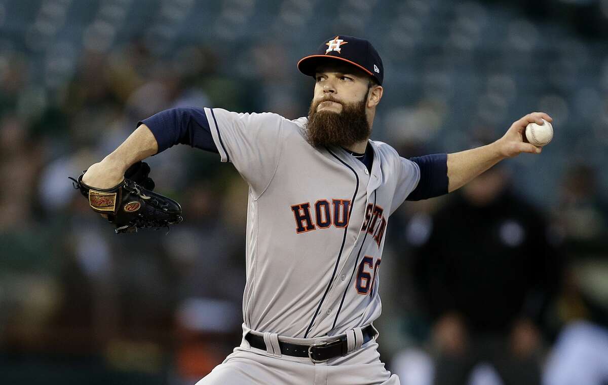 Houston Astros pitcher Dallas Keuchel works against the Oakland Athletics during the first inning of a baseball game Friday, April 14, 2017, in Oakland, Calif. (AP Photo/Ben Margot)
