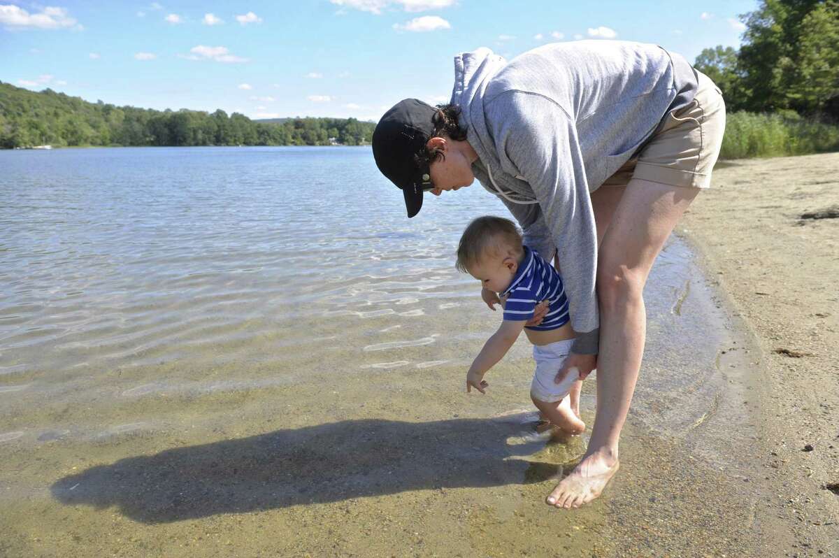 Kate Lynch-Schneider, of Fairfield, plays with her nephew Joey Patzelt on the beach of Lake Waramaug State Park, in New Preston, Conn.Tuesday, September 13, 2016.