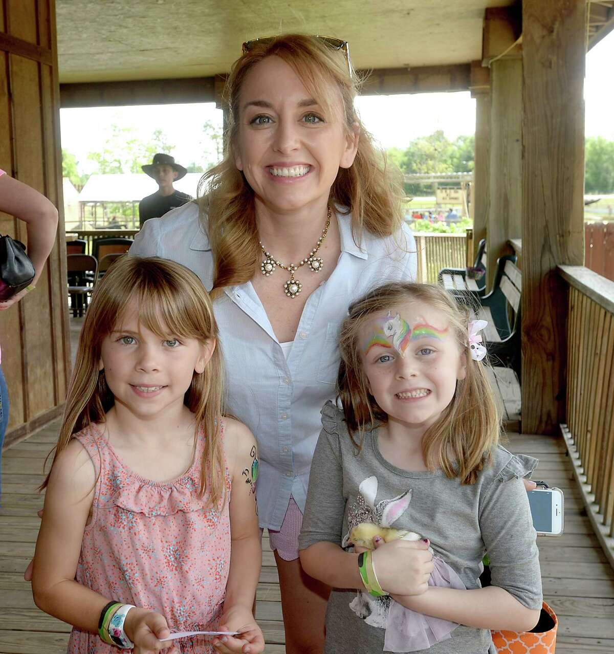 Helen Doyle, Jennifer Job, and Magnolia Seale were at the Easter Egg Hunt at Gator Country Saturday. Children scrambled through the grounds, collecting eggs and hoping to win the grand prize of a baby chick or bunny. A bullfrog catching contest and show featuring Big Al were among the family-friendly activities hosted by the gator-catching crew. Photo taken Saturday, April 15, 2017 Kim Brent/The Enterprise