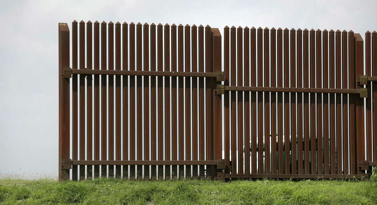 A border fence separates the U.S. and Mexico near Harlingen. President Donald Trump is seeking $1.5 billion from Congress this year for work on the first section of a border wall.