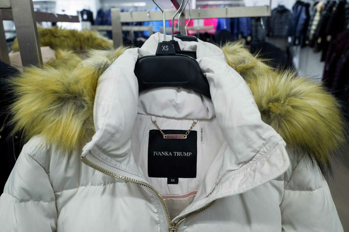 A view of an Ivanka Trump brand coat for sale at the Century 21 department store in New York City. Some retailers have pulled Trump-branded products from their websites while telling customers that they’re available in some stores.