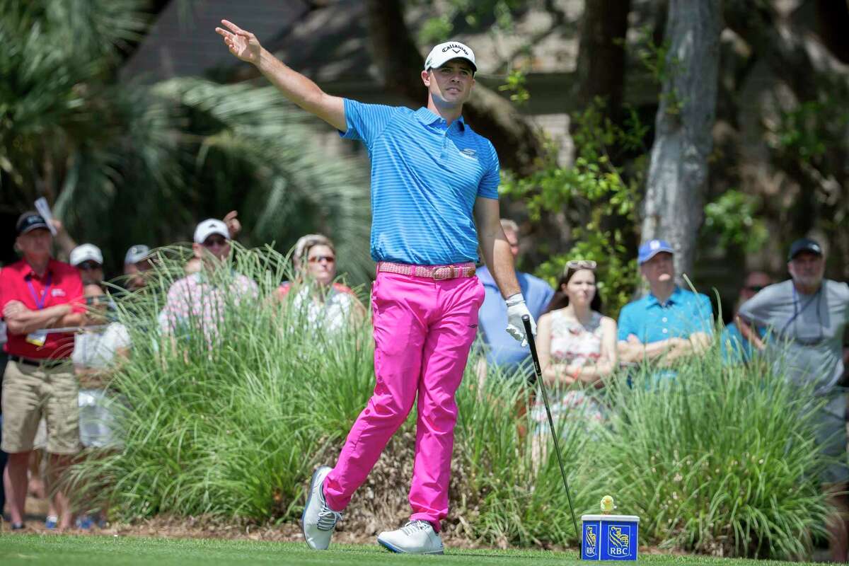 Wesley Bryan warns spectators of a wayward shot from the second tee during the final round of the RBC Heritage golf tournament in Hilton Head Island, S.C., Sunday.